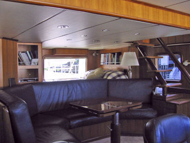 Pilothouse Settee with Queen Berth above and aft